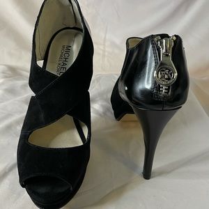 Michael Kors black Suede crisscross high heels.